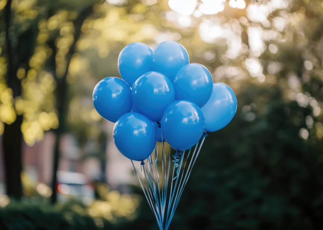A bunch of blue balloons about to be released.